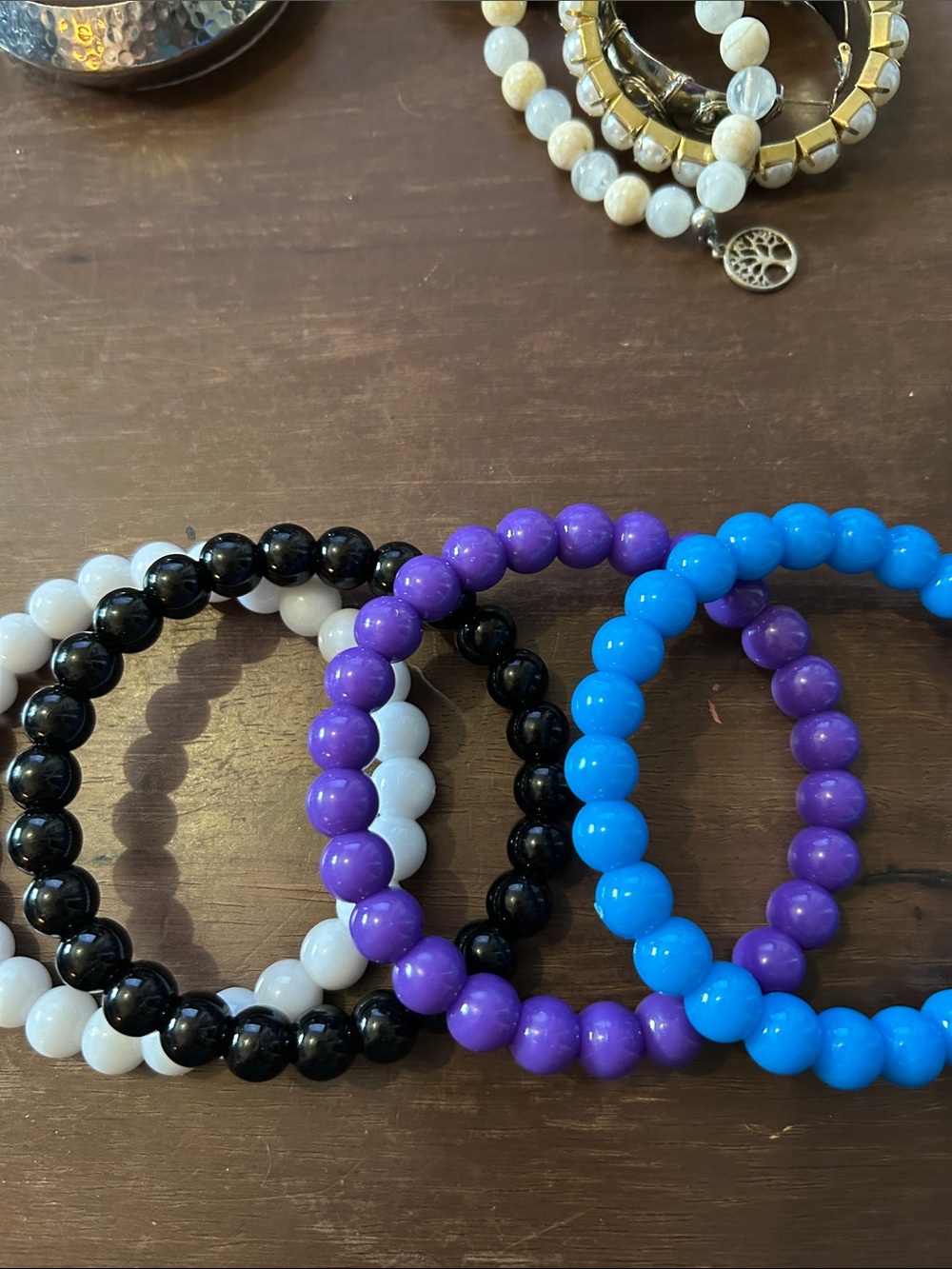 Set of 4 Bracelets — Blue, Purple, Black and white